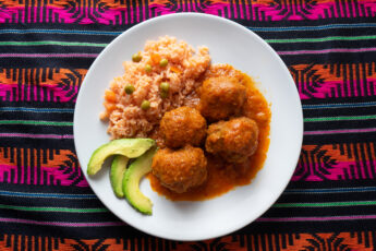Turkey Meatballs cooked with Ezra Cohen Montreal Cranberry Chipotle Zalsa, with side of rice and avacado